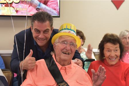 Senior resident and man celebrating birthday