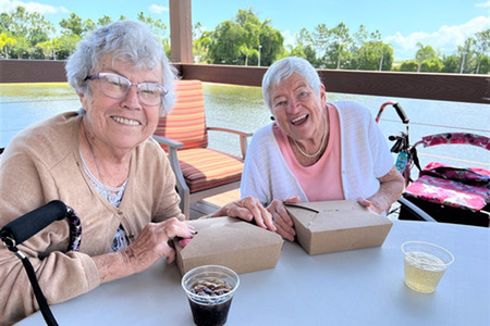ladies smiling at pavilion