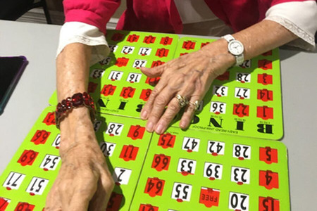 One Resident Playing Four Bingo Cards at Once