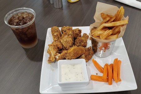 dry rub chicken wings with fries, carrots, ranch dressing & a drink