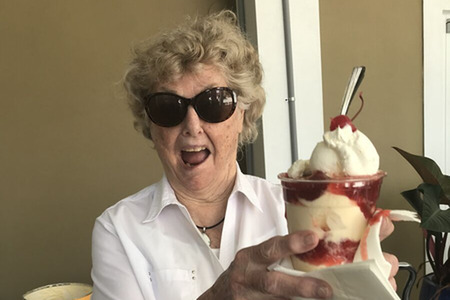 Happy Resident with Strawberry Ice Cream Sundae