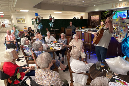 Seniors listening to entertainment