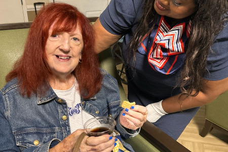 Memory Care Residents enjoying Travel Tuesdays