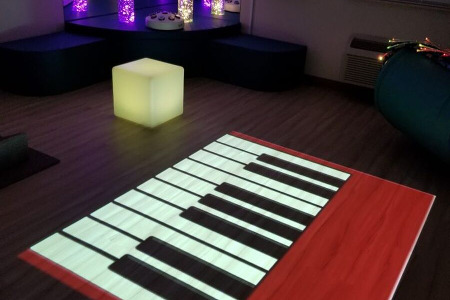 Interactive floor projector piano 
