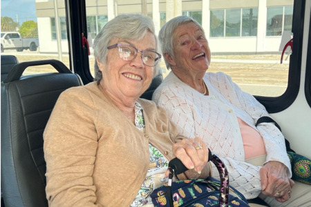2 senior ladies on a tram bus ride