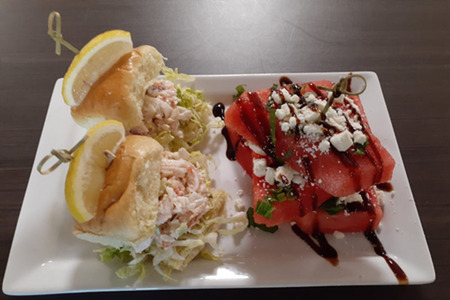 two sliders with a watermelon, feta and balsamic salad