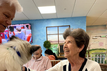 Therapy dog visiting Memory Care