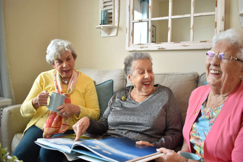 senior women residents laughing